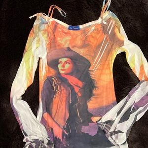 Gorgeous sheer boutique shirt, says large, but appears to be a small.
